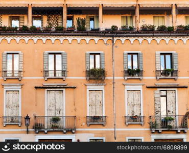 travel to Italy - facade of old apartment house in Padua city in autumn evening