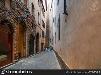 travel to Italy - long narrow street in historic district of Florence city