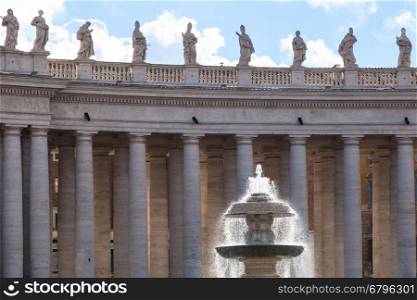travel to Italy - Maderno's fountain illuminated by sun and colonnade on piazza San Pietro in Vatican city