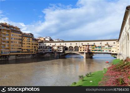 travel to Italy - Ponte Vecchio (Old Bridge) over Arno river in Florence city in sunny autumn day
