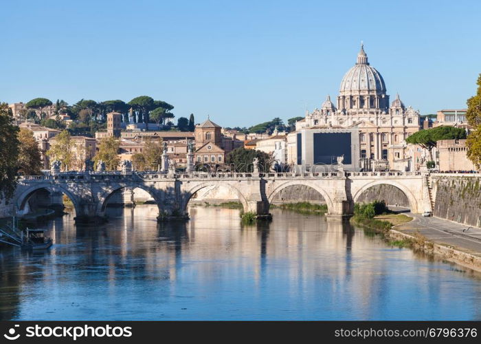 travel to Italy - Rome and Vatican city skyline with Basilica St. Peter's, Tiber river, Ponte Sant' Angelo (Bridge of Holy Angel) in autumn morning