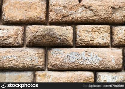 travel to Italy - rows of brown stone blocks in wall of Palazzo Pitti in Florence city