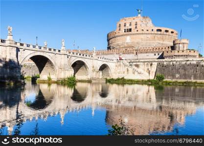 travel to Italy - scenery with Castel Sant Angelo (Castle of the Holy Angel, Mausoleum of Hadrian) and bridge of St Angel in Rome city from Tiber river in sunny day