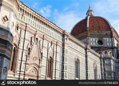 travel to Italy - side view of Florence Duomo Cathedral (Cattedrale Santa Maria del Fiore, Duomo di Firenze, Cathedral of Saint Mary of the Flowers) from Piazza del Duomo in Florence city