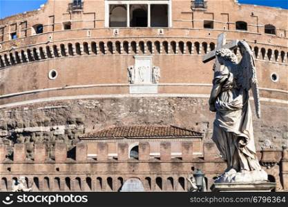 travel to Italy - statue of Angel on bridge Ponte Sant Angelo near Castle of Holy Angel in Rome city