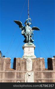 travel to Italy - statue of Michael the Archangel on top of Castle of Holy Angel in Rome city
