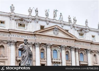 travel to Italy - Statue Saint Peter in front of St Peter's Basilica on piazza San Pietro in Vatican city
