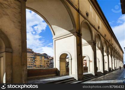 travel to Italy - vasari corridor along quay in Florence city in sunny autumn day