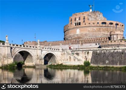 travel to Italy - view of Castel Sant Angelo (Castle of the Holy Angel, Mausoleum of Hadrian) and bridge of St Angel in Rome city from Tiber river in sunny day