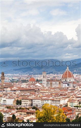 travel to Italy - view of cloudy sky over center of Florence city from San Miniato al Monte in autumn