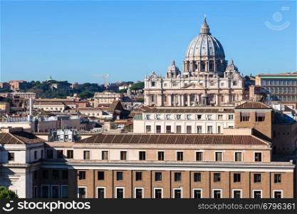 travel to Italy - view of St Peter's Basilica in Vatican city and houses in Borgo district in Rome from San Angelo Castle