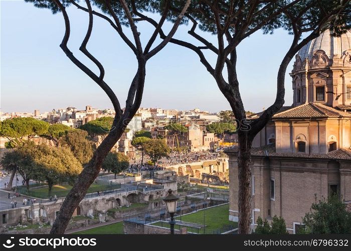travel to Italy - view on Roman forums and Church santi luca e martina near Forum of Caesar in Rome city