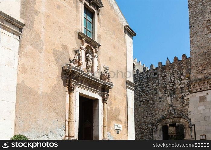 travel to Sicily, Italy - facades of church Chiesa di santa Caterina d' Alessandria and Palazzo Corvaia on square Piazza Badia in Taormina city