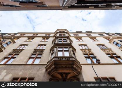 travel to Vienna city - apartment houses on narrow street in Vienna (Annagasse), Austria