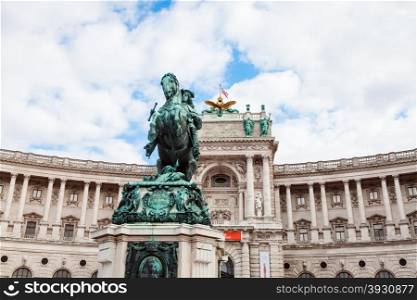travel to Vienna city - statue of Prince Eugene of Savoy and Neue Burg Palace in Hofburg, Vienna, Austria