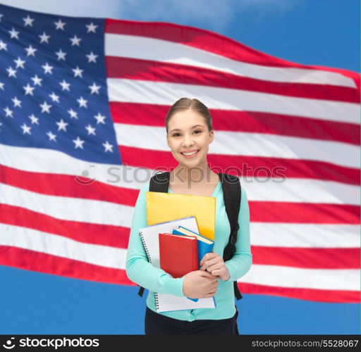 travel, tourism and education concept - happy and smiling teenage girl