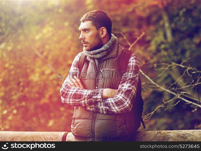 travel, tourism and hike concept - sad man with backpack outdoors. man with backpack outdoors
