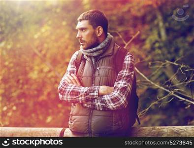 travel, tourism and hike concept - sad man with backpack outdoors. man with backpack outdoors