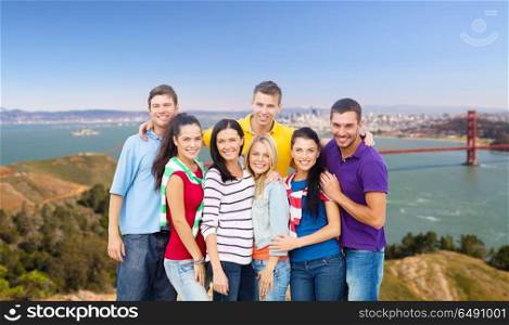 travel, tourism and people concept - group of happy friends over golden gate bridge in san francisco bay background. group of happy friends over golden gate bridge. group of happy friends over golden gate bridge