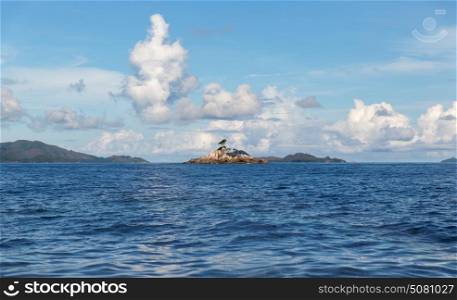 travel, tourism and seascape concept - view to indian ocean and seychelles islands. view to indian ocean and seychelles islands
