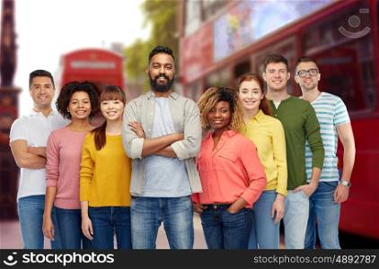 travel, tourism, diversity, ethnicity and people concept - international group of happy smiling men and women over london city street background