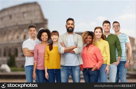travel, tourism, diversity, ethnicity and people concept - international group of happy smiling men and women over coliseum background. international group of people over coliseum