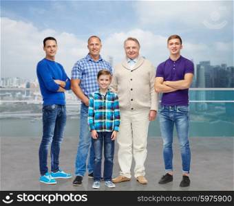 travel, tourism, generation and people concept - group of smiling men and boy over singapore city background