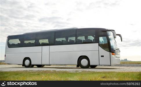 travel, tourism, road trip and passenger transport - tour bus driving outdoors