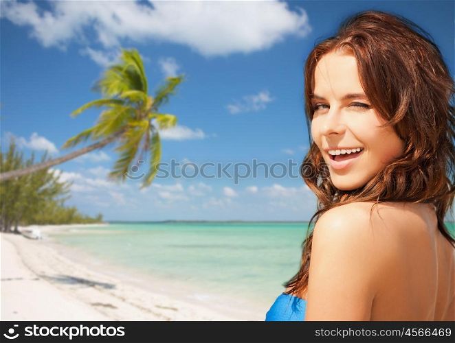 travel, tourism, summer vacation and people concept - happy beautiful woman over tropical beach with sea and palm tree background