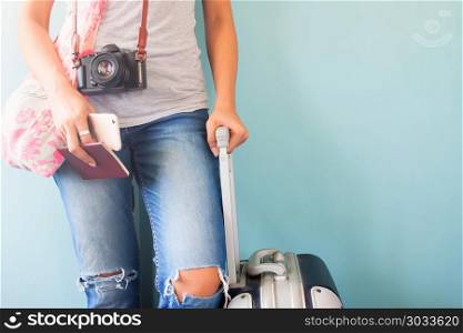 Travel tourist standing with suitcase holding passport and smart. Travel tourist standing with suitcase holding passport and smart phone, Summer vacation concept