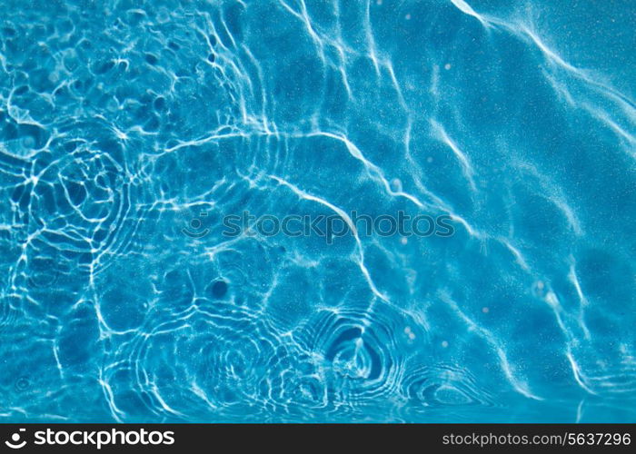 travel, vacation and background concept - water in pool, sea or ocean