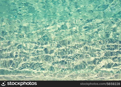 travel, vacation and background concept - water in pool, sea or ocean