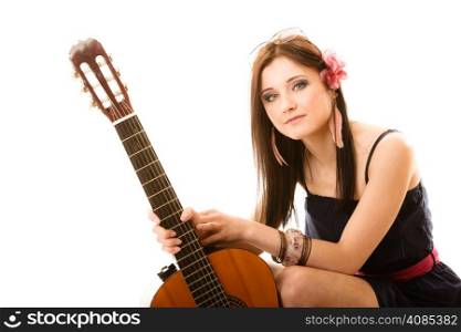 Travel vacation concept. Music lover summer girl hippie style holding acoustic guitar isolated on white