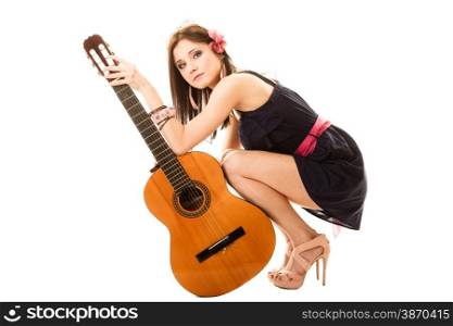 Travel vacation concept. Music lover summer girl hippie style in full length holding acoustic guitar isolated on white