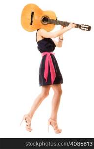 Travel vacation concept. Music lover summer girl in full length holding acoustic guitar isolated on white