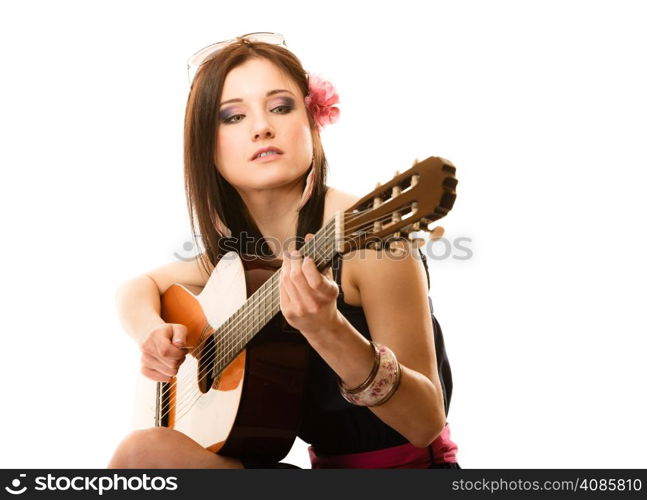 Travel vacation concept. Music lover summer girl playing acoustic guitar isolated on white background