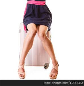 Travel vacation concept. summer fashion woman in voyage, female legs and pink suitcase luggage bag.