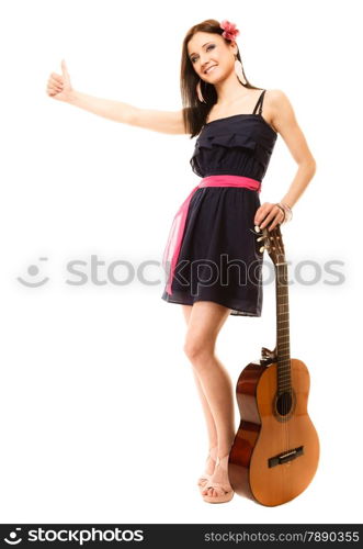 Travel vacation hitchhiking concept. Summer girl hippie style in full length with acoustic guitar thumbing and hitch hiking, isolated on white