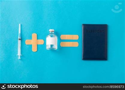travel, vaccination and healthcare concept - disposable syringe, medicine, patches and immunity passport on blue background. syringe, medicine, patches and immunity passport
