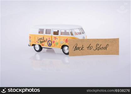 Travel van and back to school title and back to school title on a notebook