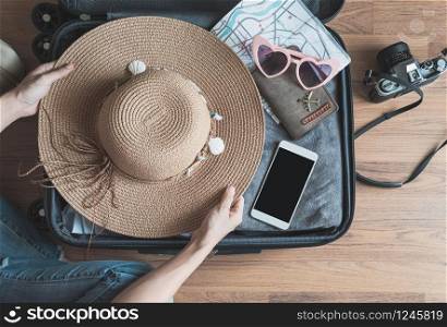 Traveler baggage with clothes and accessories, Travel vacation trip concept