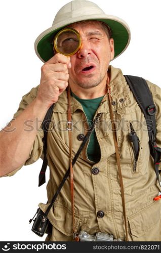 traveler in a cork helmet and khaki clothes looking at a magnifying glass. Cork Helmet Explorer