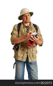traveler in a cork helmet and khaki clothes photographs something on the camera. Cork Helmet Explorer