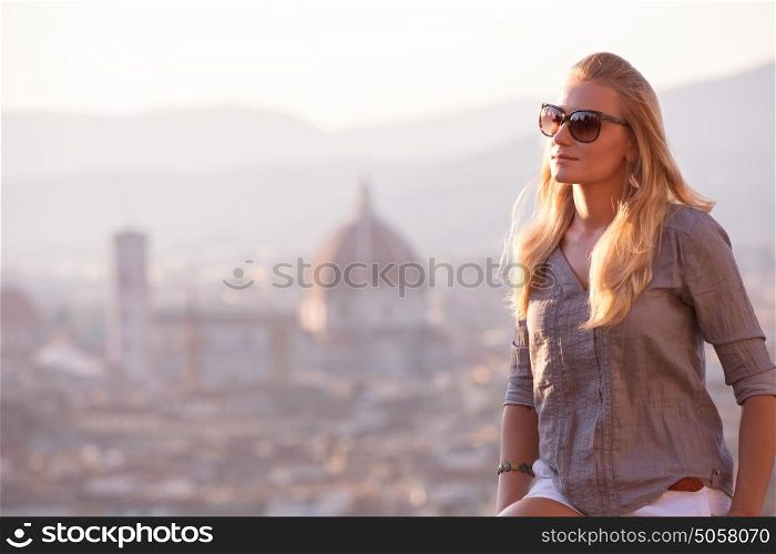 Traveler woman on cityscape background, Florence cityscape and cathedral Saint Mary of the Flower, Basilica di Santa Maria del Fiore in Tuscany Florence