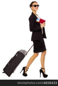 Traveling businesswoman isolated on white