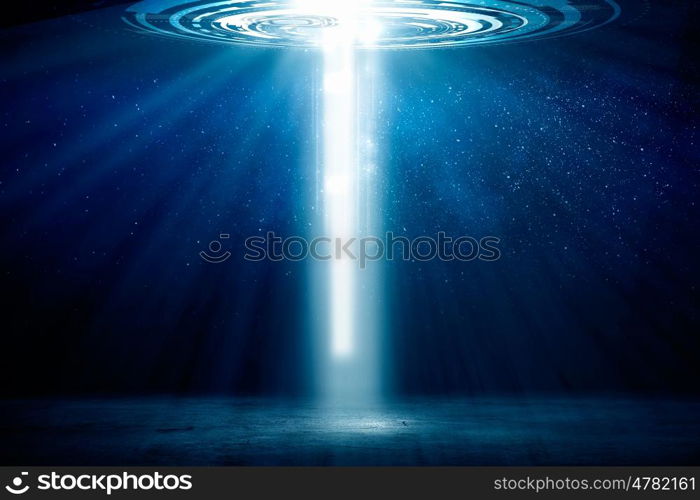 Traveling trough space and time. Background image with light portal coming from sky