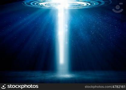 Traveling trough space and time. Background image with light portal coming from sky