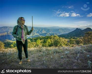 traveling woman trekking on high mountain for people vacation lifstyle in natural destination