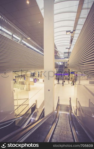 Travelling scene on train station, moving stairway for public transport