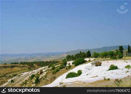 Travertine pools and terraces with water, Pamukkale, Hierapolis Turkey.